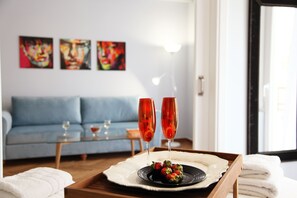 Deluxe Suite (Acropolis View & Balcony) Poseidon | Living area | Flat-screen TV - My Athens House (Athens)