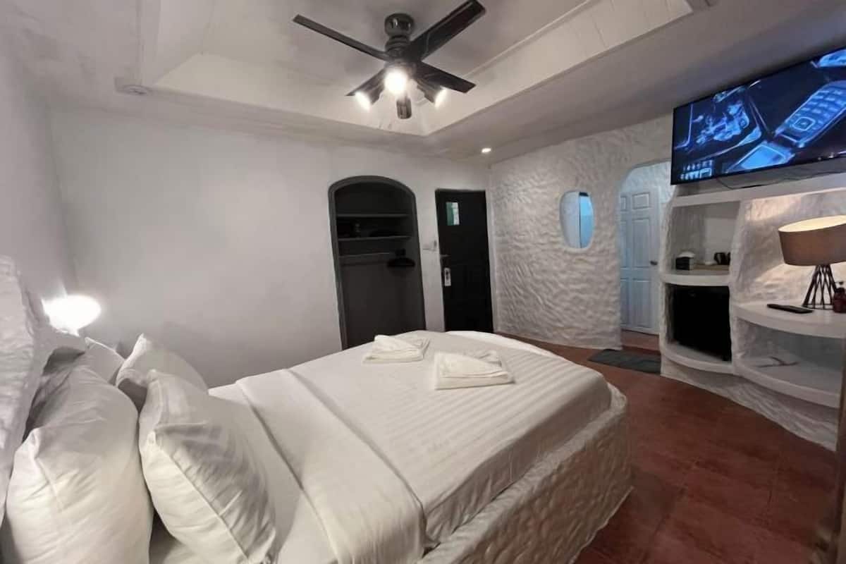 Premium bedding, pillow-top beds, in-room safe, blackout curtains
