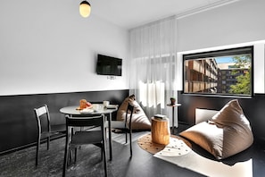Two-Bedroom Apartment For Four | Living room | Flat-screen TV