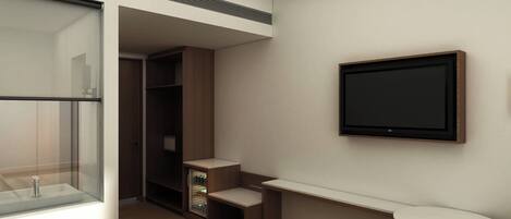 Una habitación de hotel moderna con cabina de ducha de vidrio, armario empotrado, televisor de pantalla plana en la pared y una mesita de noche pequeña.