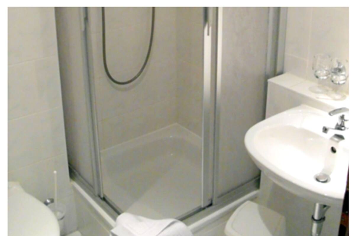 Regadera en el baño