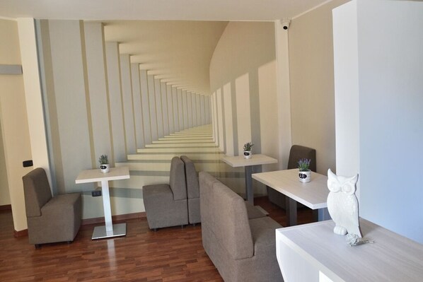 Deluxe-Doppel- oder -Zweibettzimmer, Balkon | Wohnbereich