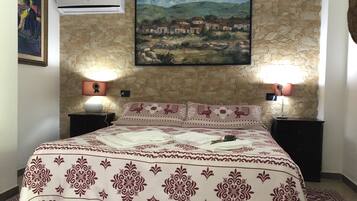 Apartment, 1 Bedroom, Patio, Garden View | Minibar, desk, free WiFi