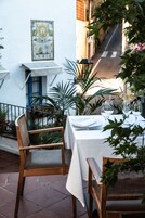 Breakfast, lunch, dinner served; local cuisine 