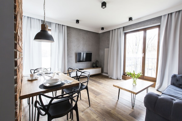 Premium Apartment, 1 Bedroom, Balcony | Living area | Flat-screen TV