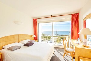 Double Room, Sea View | Minibar, in-room safe, iron/ironing board, free WiFi
