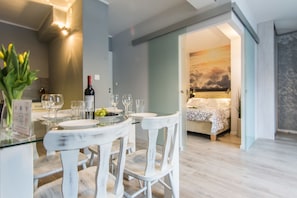 Deluxe Apartment, 1 Bedroom | 1 bedroom, iron/ironing board, free cribs/infant beds, travel crib