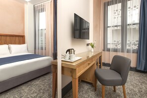 Ropa de cama de alta calidad y minibar 