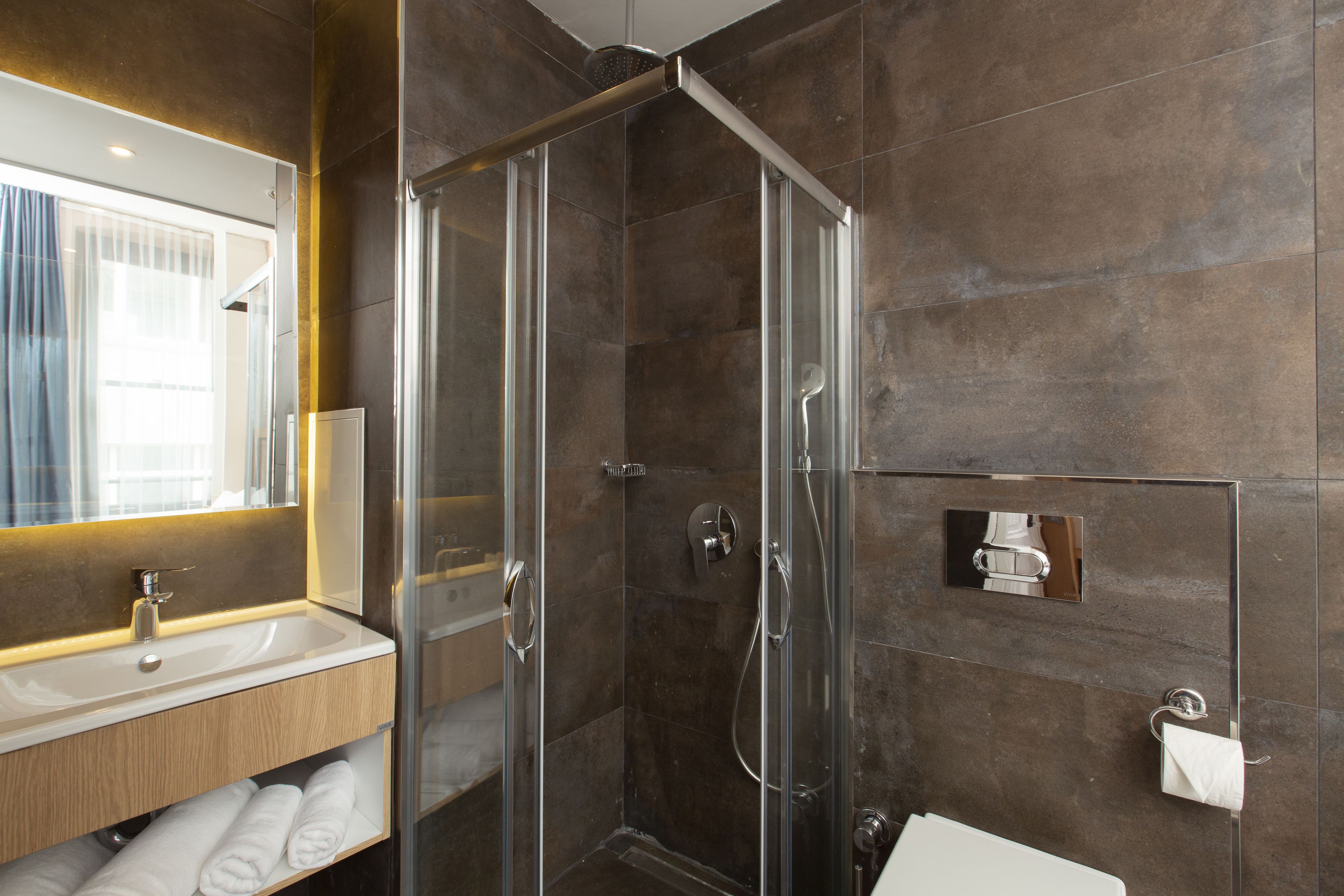 superior double room | bathroom | shower, free toiletries, hair dryer, bathrobes