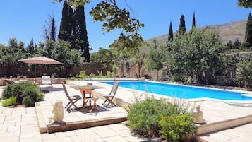 Seasonal outdoor pool, pool umbrellas, sun loungers