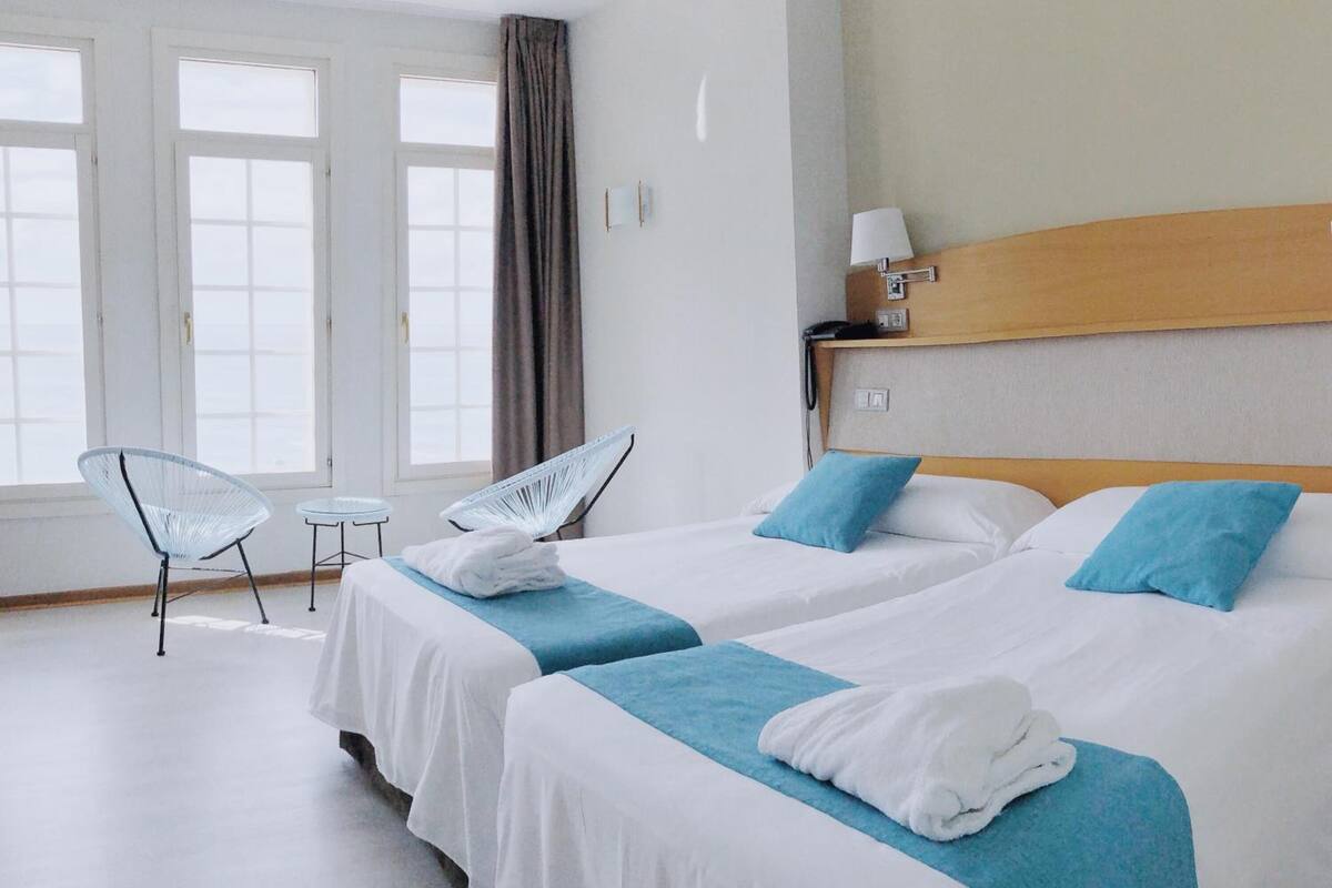 desk, blackout curtains, free wifi, bed sheets