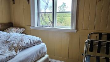 Down duvets, blackout curtains, iron/ironing board, free WiFi