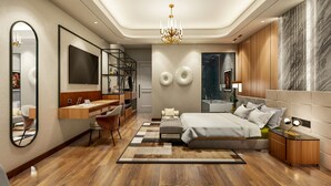 Un dormitorio moderno con una cama grande, un escritorio y un armario.