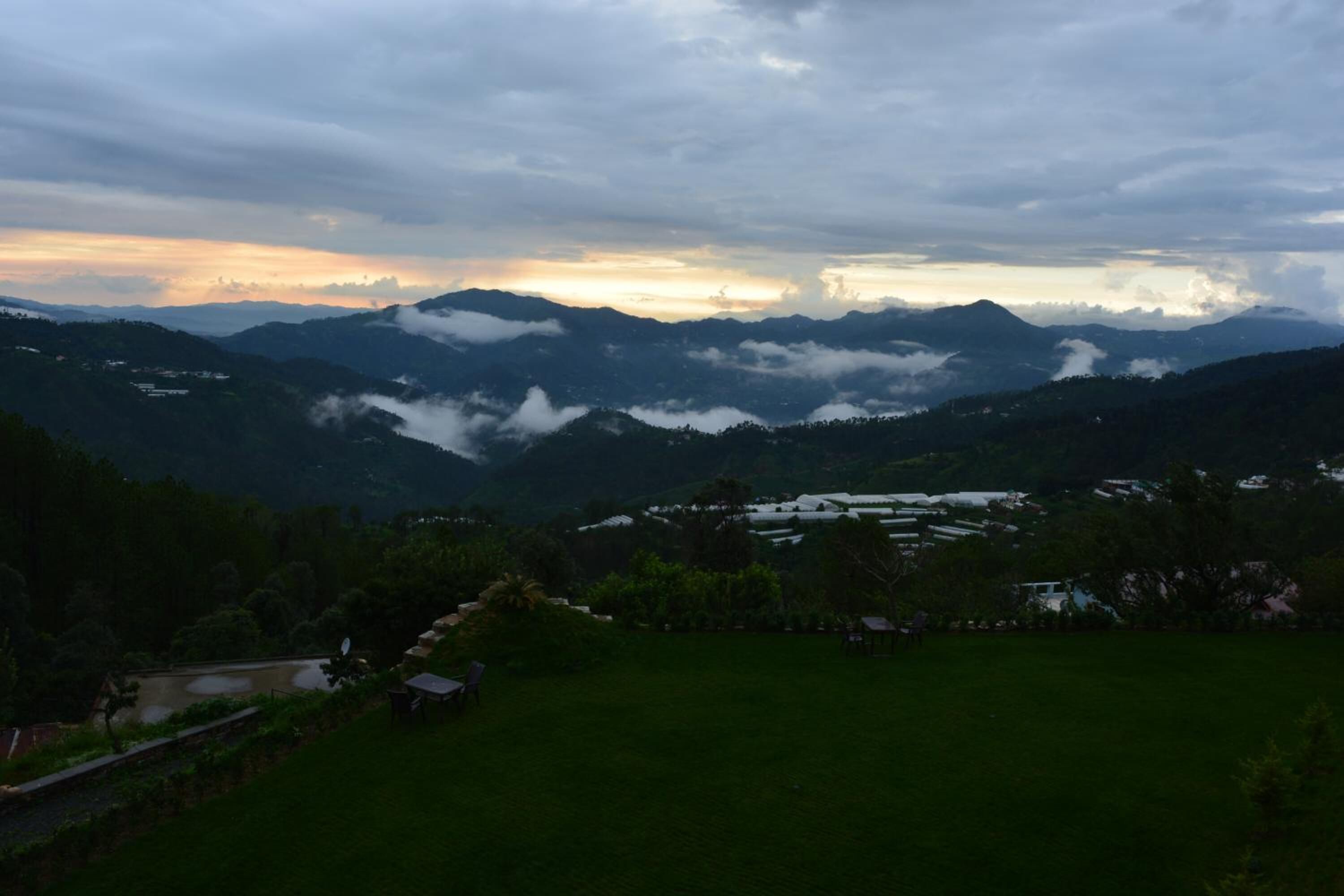 A mountainous landscape with a view of the valley below.