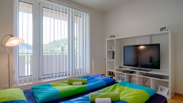 Luxury Suite, 1 Bedroom, Kitchen, Hill View | Living room | Flat-screen TV