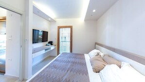 Departamento Deluxe, 3 habitaciones | 3 habitaciones y ropa de cama de alta calidad 