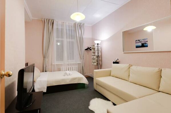 Familienapartment, 1 Schlafzimmer | 1 Schlafzimmer, Schreibtisch, Bügeleisen/Bügelbrett, kostenloses WLAN