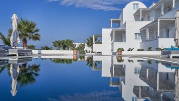 Outdoor pool, pool umbrellas, pool loungers