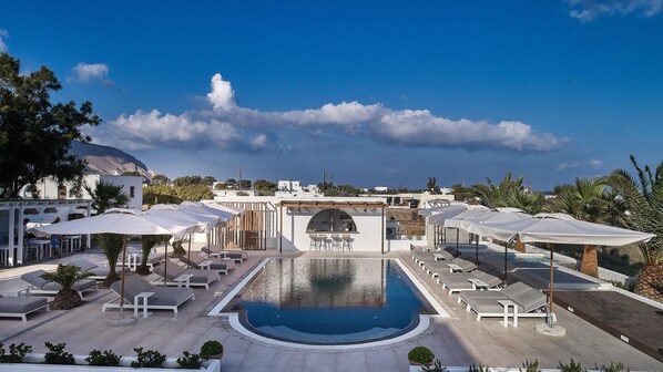 Outdoor pool, pool umbrellas, pool loungers