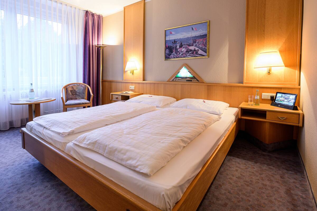 Premium bedding, desk, WiFi (free), bed sheets