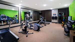 A gym with treadmills, elliptical machines, and weight machines. - La Quinta Inn & Suites by Wyndham Tuscaloosa University (Tuscaloosa)