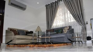 Apartment, 1 Bedroom | Living room | Flat-screen TV - Jaria Apartments (Accra)
