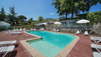 Seasonal outdoor pool, open 10:00 AM to 8:00 PM, pool loungers