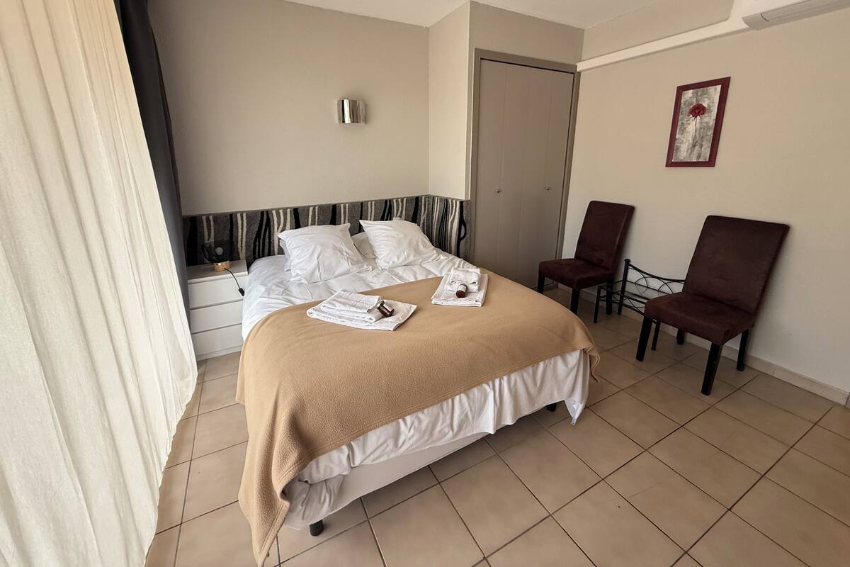 Double or Twin Room | Desk, iron/ironing board (on request), cribs (free), bed sheets