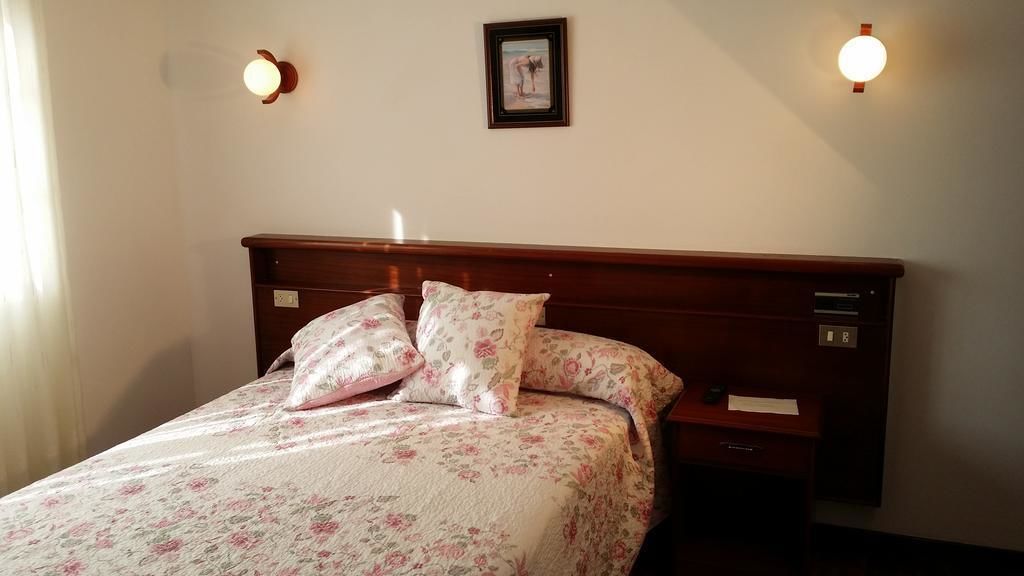 desk, blackout curtains, rollaway beds, free wifi