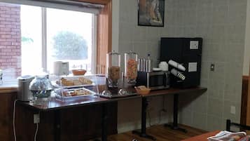 Daily buffet breakfast (USD 8 per person)