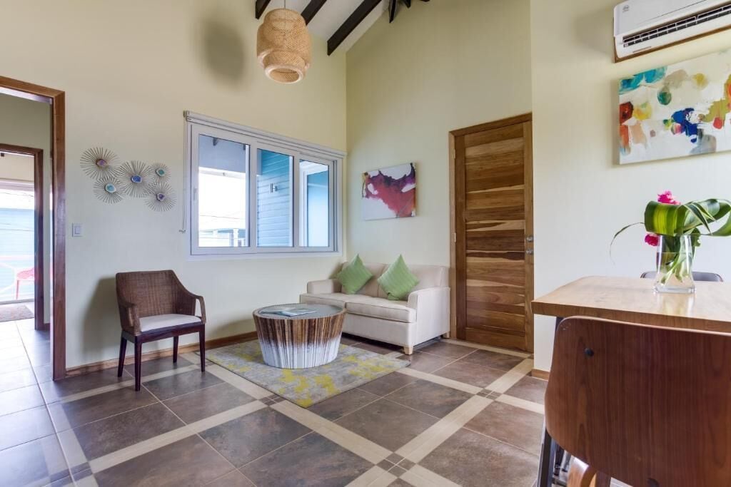 condo, 1 bedroom, ocean view | living area | 32-inch tv with cable channels