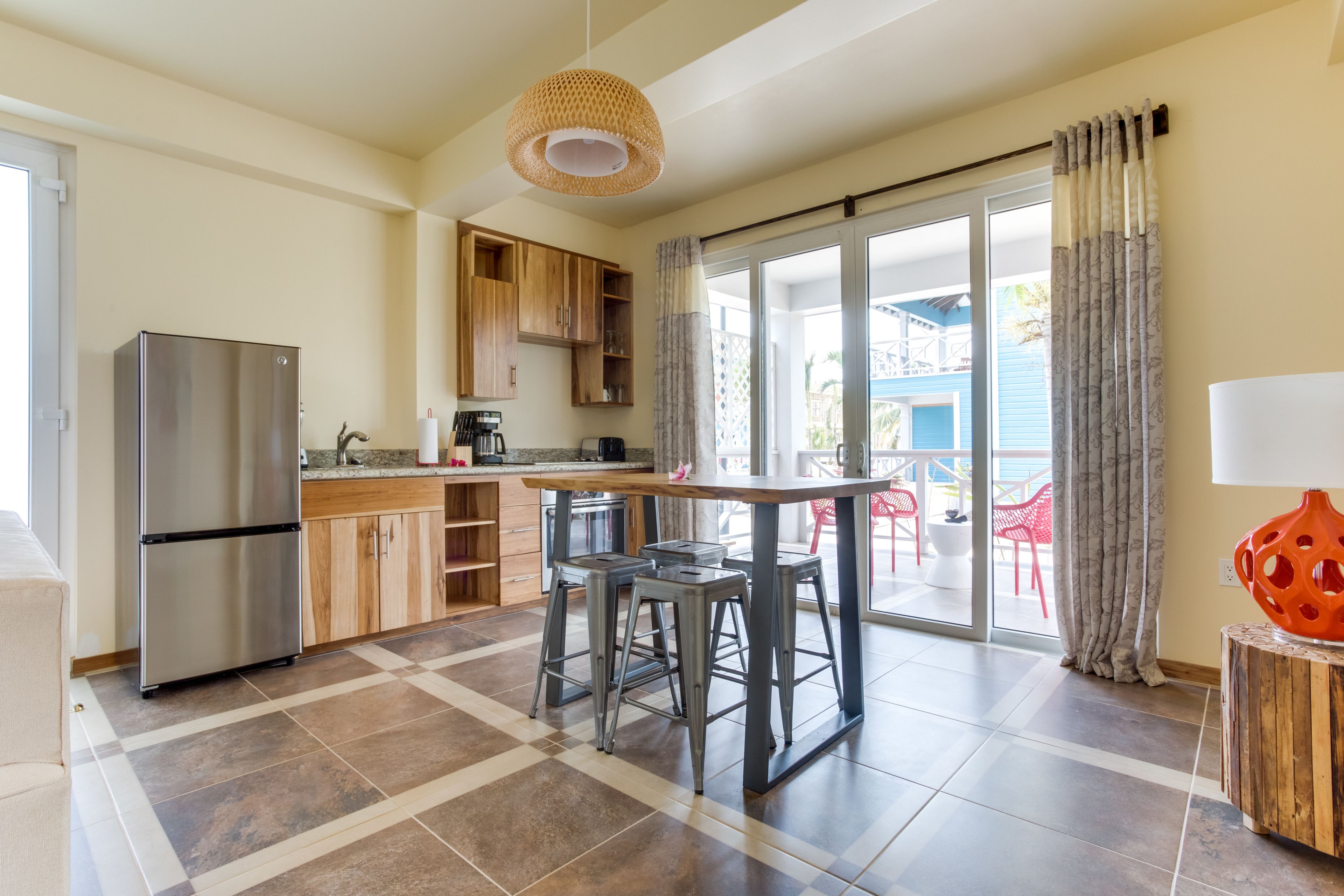 luxury suite, multiple bedrooms, kitchen, beach view | living area | 32-inch tv with cable channels