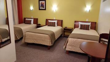 Triple Room | Egyptian cotton sheets, premium bedding, down duvets, in-room safe