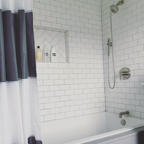 Combined shower/tub, hair dryer, towels, shampoo