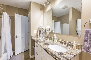 Combined shower/tub, hair dryer, towels, soap