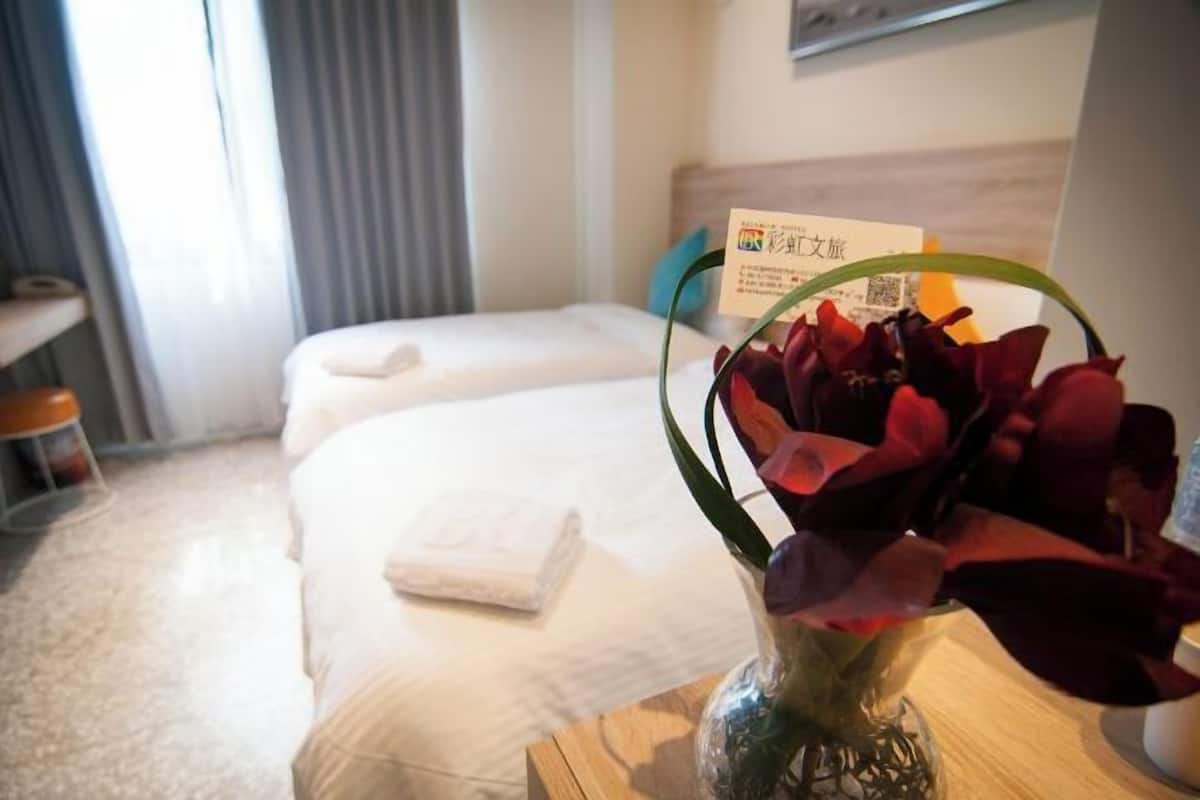 Desk, blackout drapes, WiFi (free), bed sheets