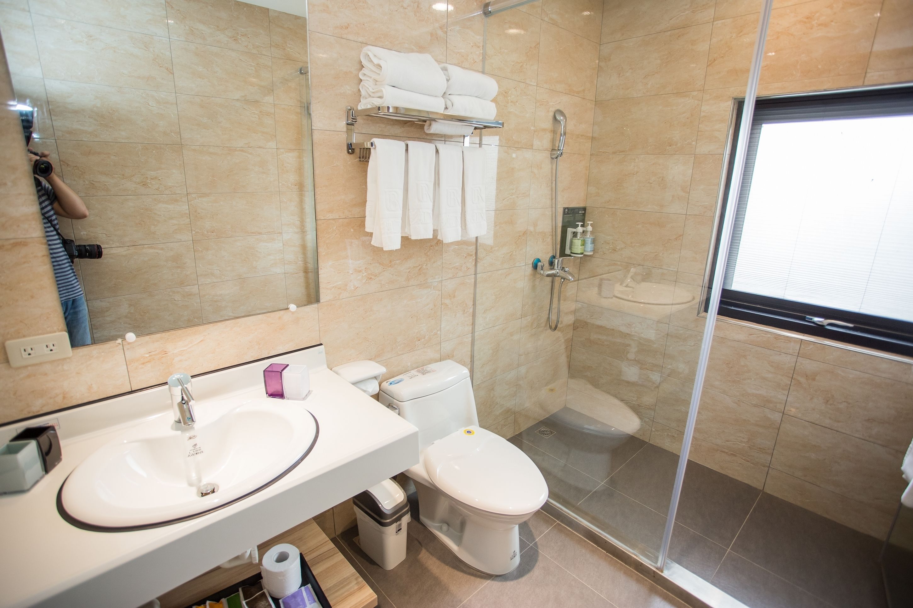 shower, hair dryer, slippers, bidet