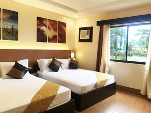 Deluxe Twin Room, 2 Queen Beds, Resort View | Desk, iron/ironing board, bed sheets - Klir Waterpark Resort (Plaridel)