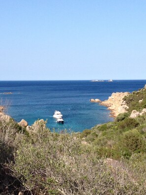 On the beach, sun loungers, beach towels