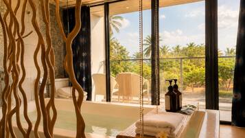 Separate tub and shower, rainfall showerhead, hair dryer, towels