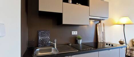 Fridge, microwave, stovetop, coffee/tea maker