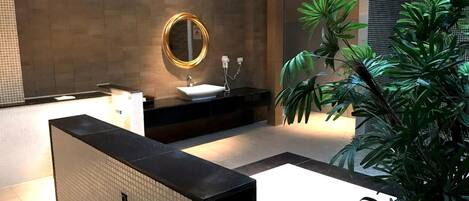 Separate tub and shower, jetted tub, free toiletries, hair dryer