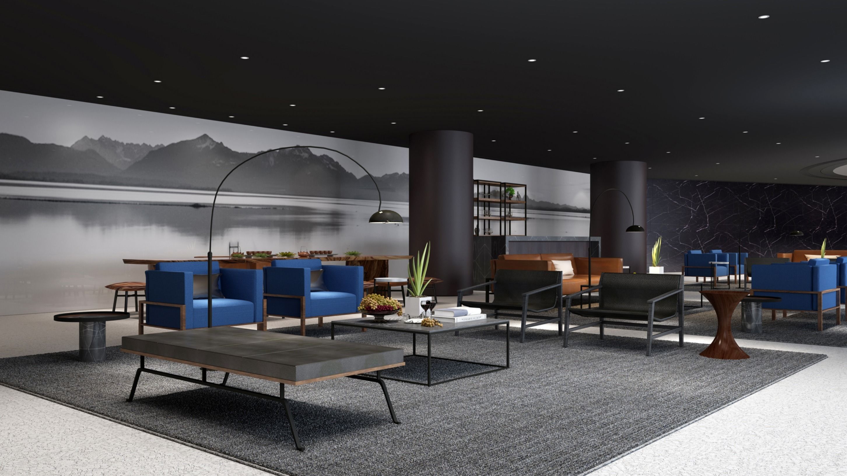 Un hall d’entrée moderne avec des canapés bleus, une table basse et une grande fresque murale représentant un paysage de montagne.