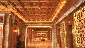 A grand lobby with a marble floor, ornate ceiling, and a patterned carpet. - ChengDu Trika Tsang International Hotel (Chengdu)