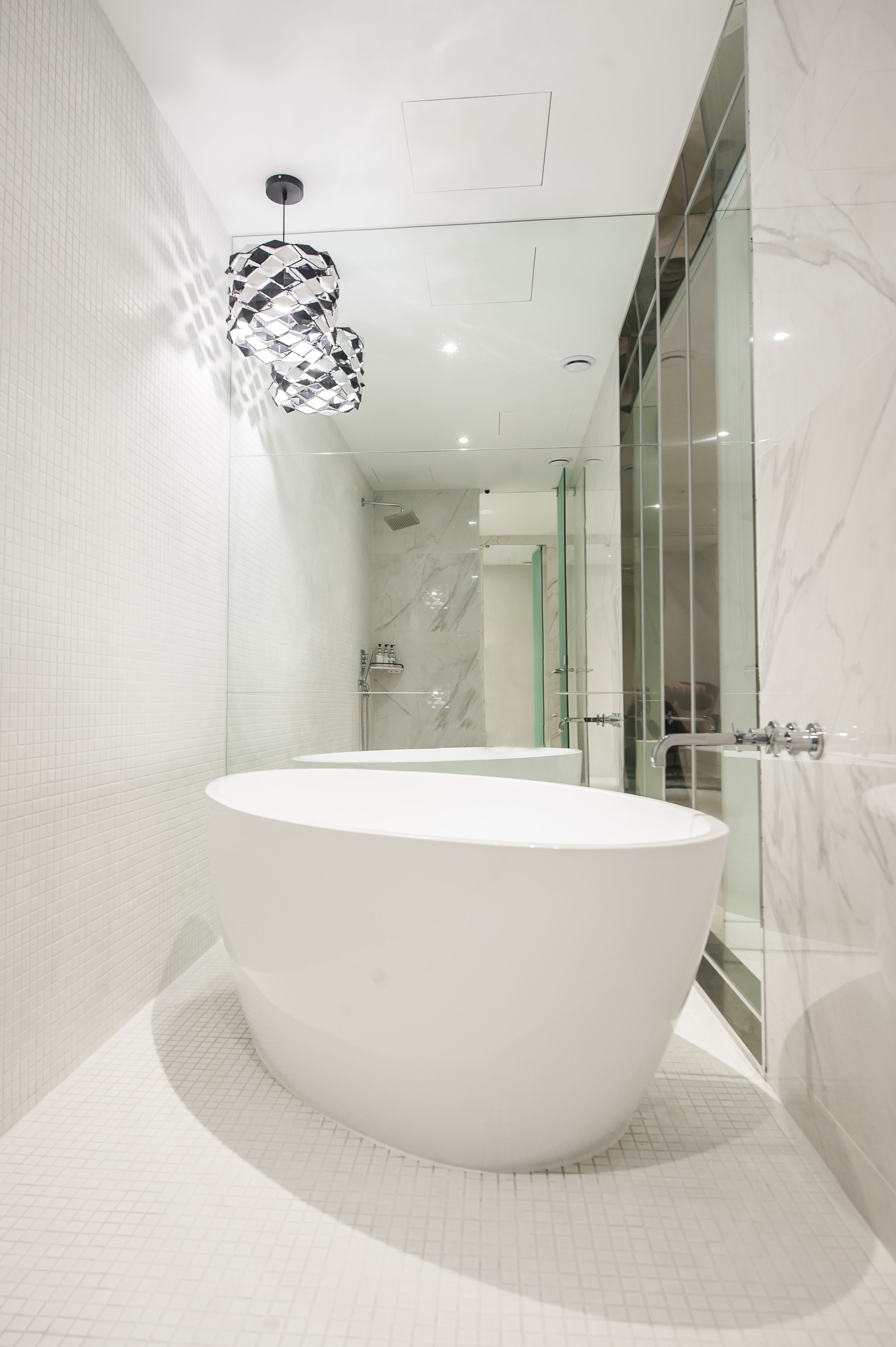 deluxe twin room | bathroom | separate bathtub and shower, deep-soaking bathtub, hair dryer, bathrobes