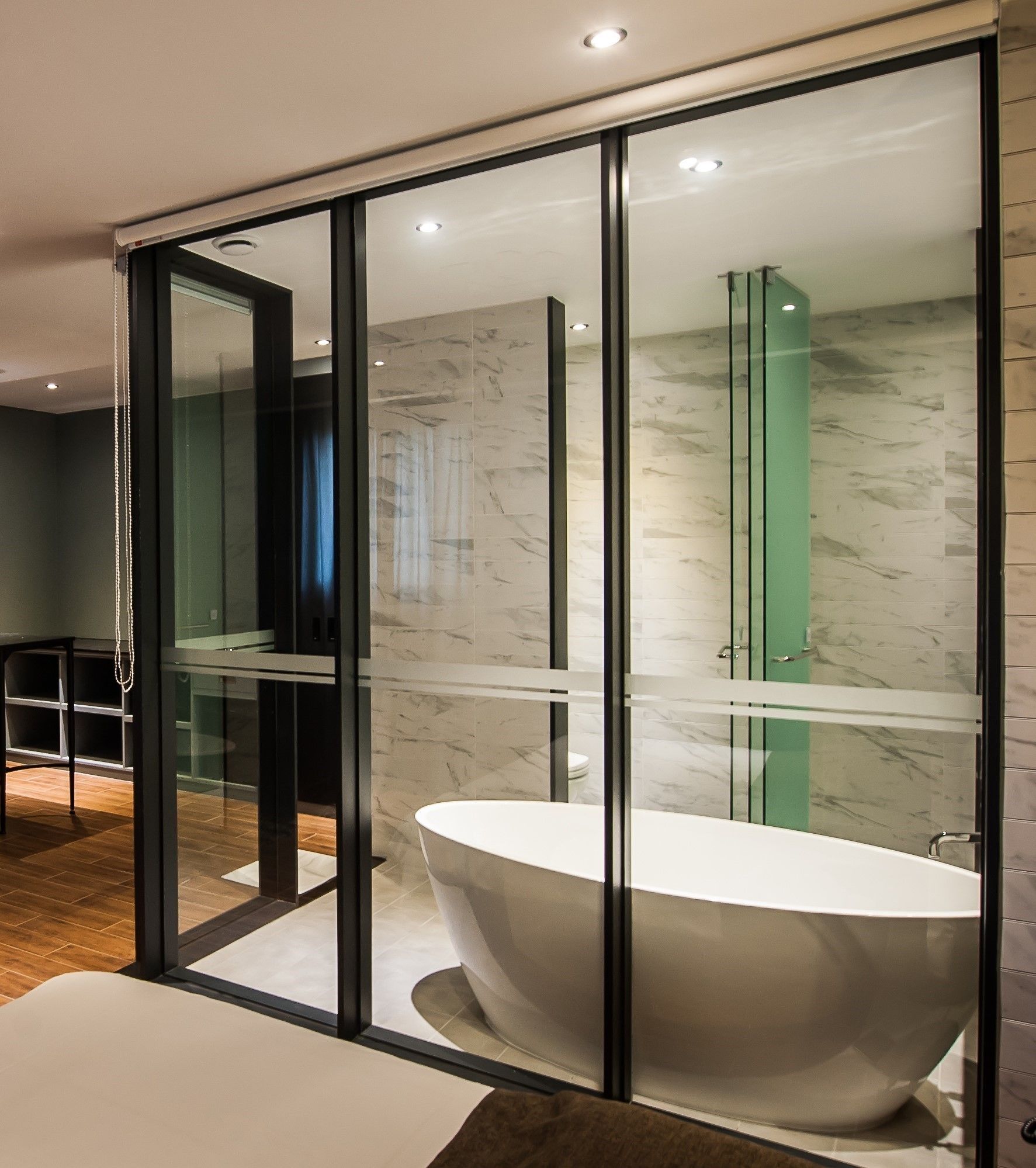 junior suite | bathroom | separate bathtub and shower, deep-soaking bathtub, hair dryer, bathrobes