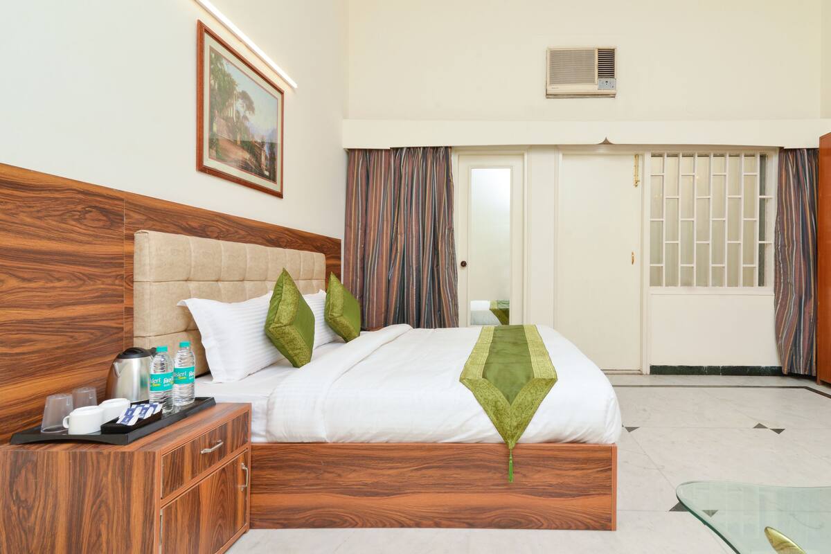 Habitación Deluxe | Escritorio, tabla de planchar con plancha, camas extra y wifi gratis