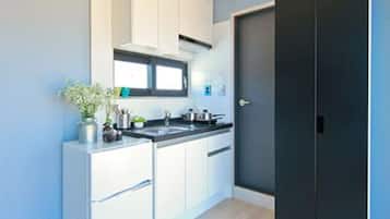 Family Room | Private kitchenette | Fridge