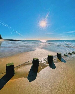 On the beach, sun loungers