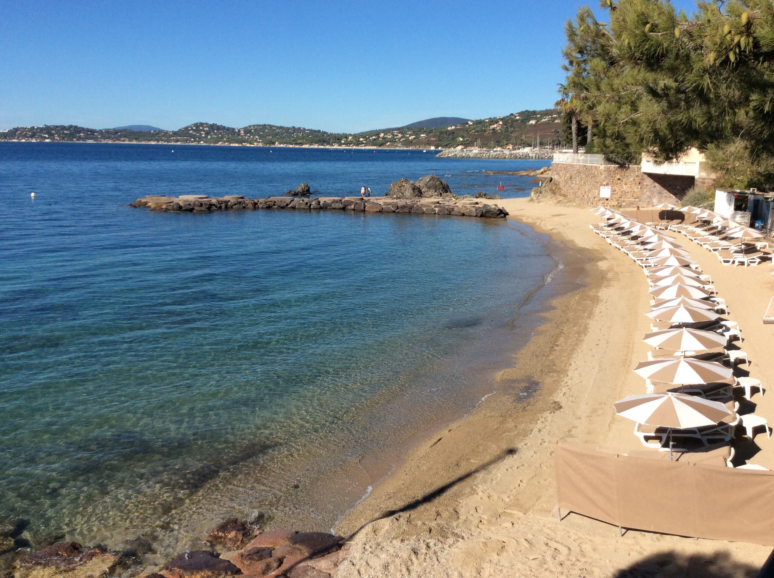 On the beach, sun-loungers